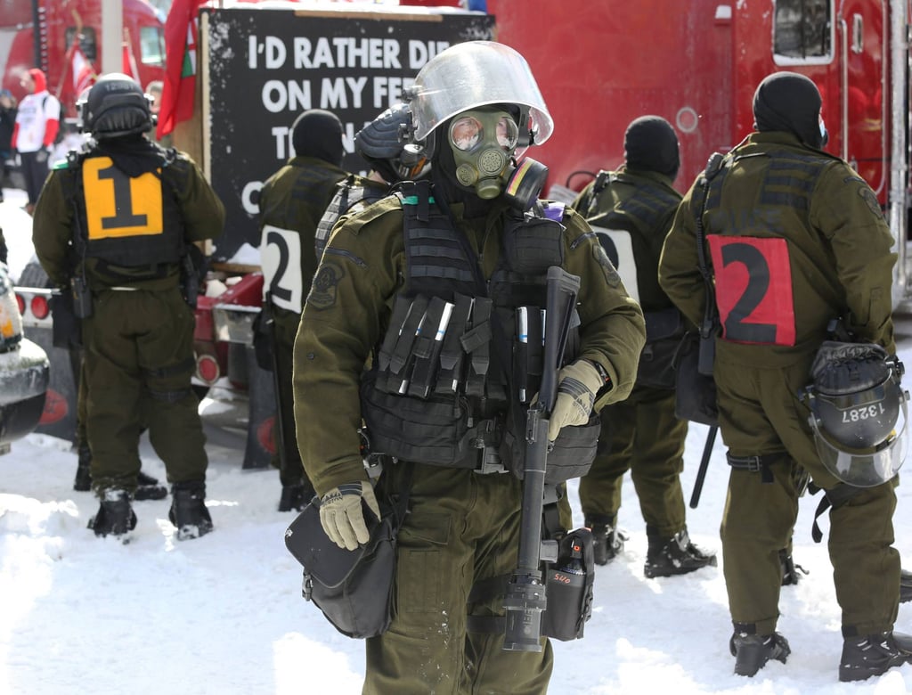 Police deploy to remove demonstrators against Covid-19 mandates in Ottawa on Friday. Photo: AFP