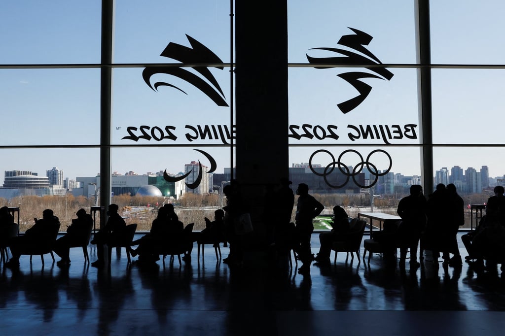 People queue up for Bing Dwen Dwen merchandise at a souvenir shop at the Main Press Centre in Beijing. Photo: Reuters People queue up for Bing Dwen Dwen merchandise at a souvenir shop at the Main Press Centre in Beijing. Photo: Reuters