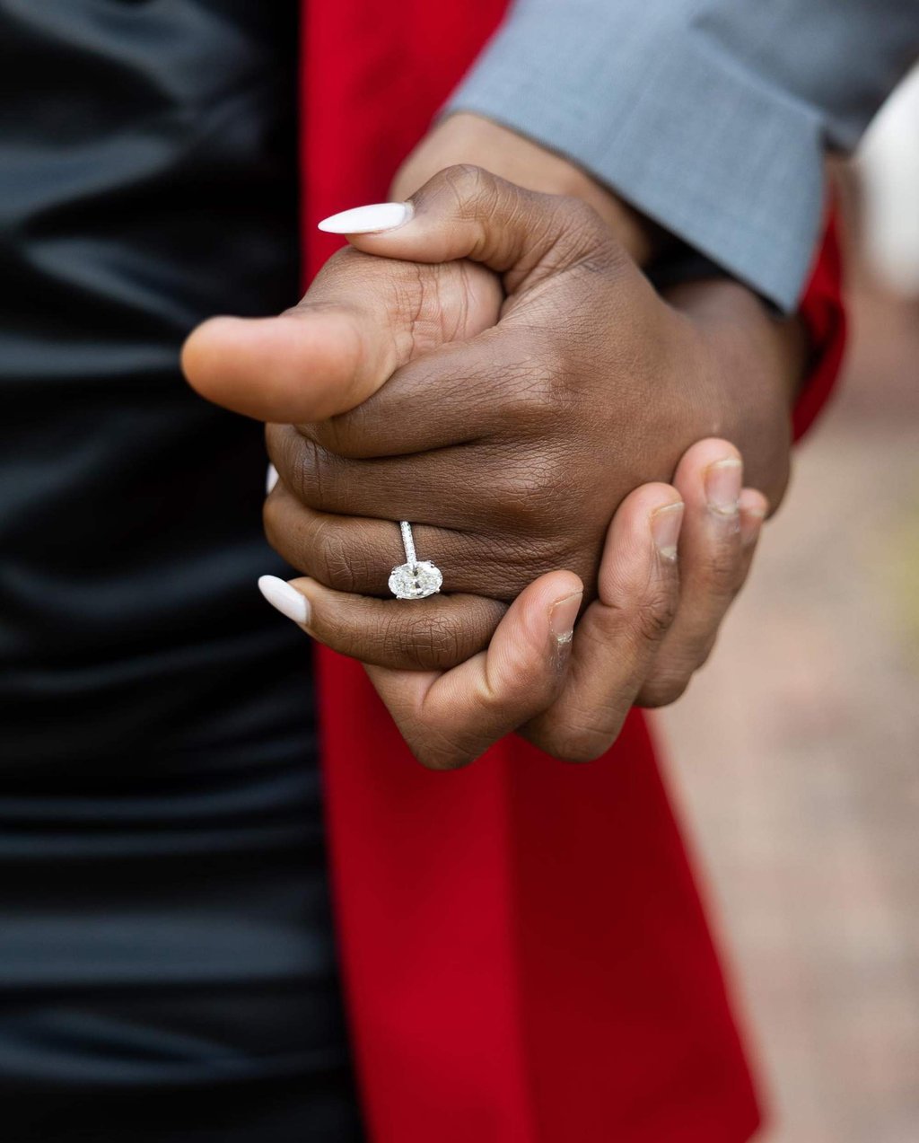 Simone Biles and Jonathan Owens shared a close up of their hands linked together with Biles’ engagement ring front and centre. Photo: @simonebiles/Instagram