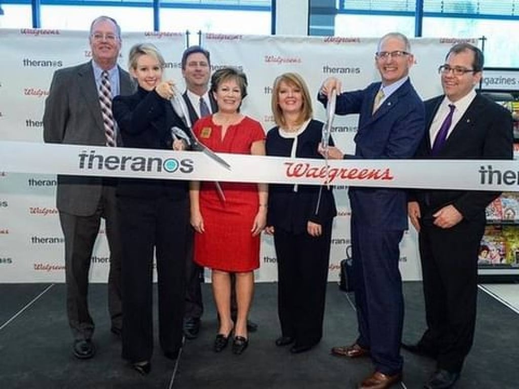 Elizabeth Holmes at a Walgreens with the Theranos team. Photo: @thatshitispoison/Instagram