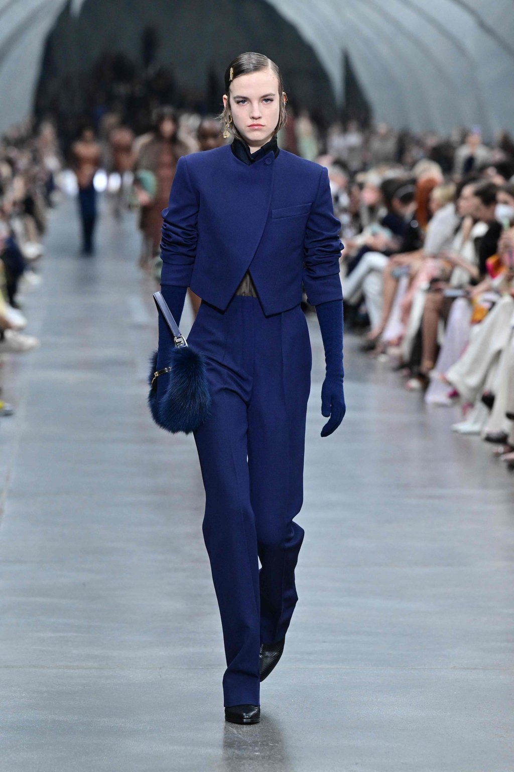 A model in a navy outfit for Fendi’s catwalk show for its women’s autumn/winter 2022-2023 show on the second day of the Milan Fashion Week in Milan, on February 23. Photo: AFP