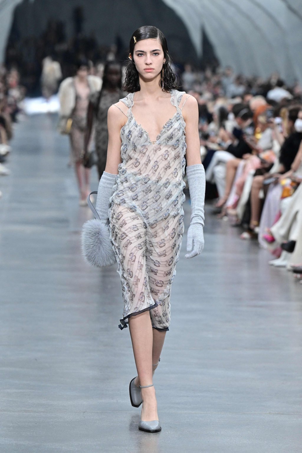 Milan Fashion Week 2022 How Fendi put a fresh spin on classic looks including collections by Karl Lagerfeld for its women s autumn winter 2022 23 show with Bella Hadid leading the pack