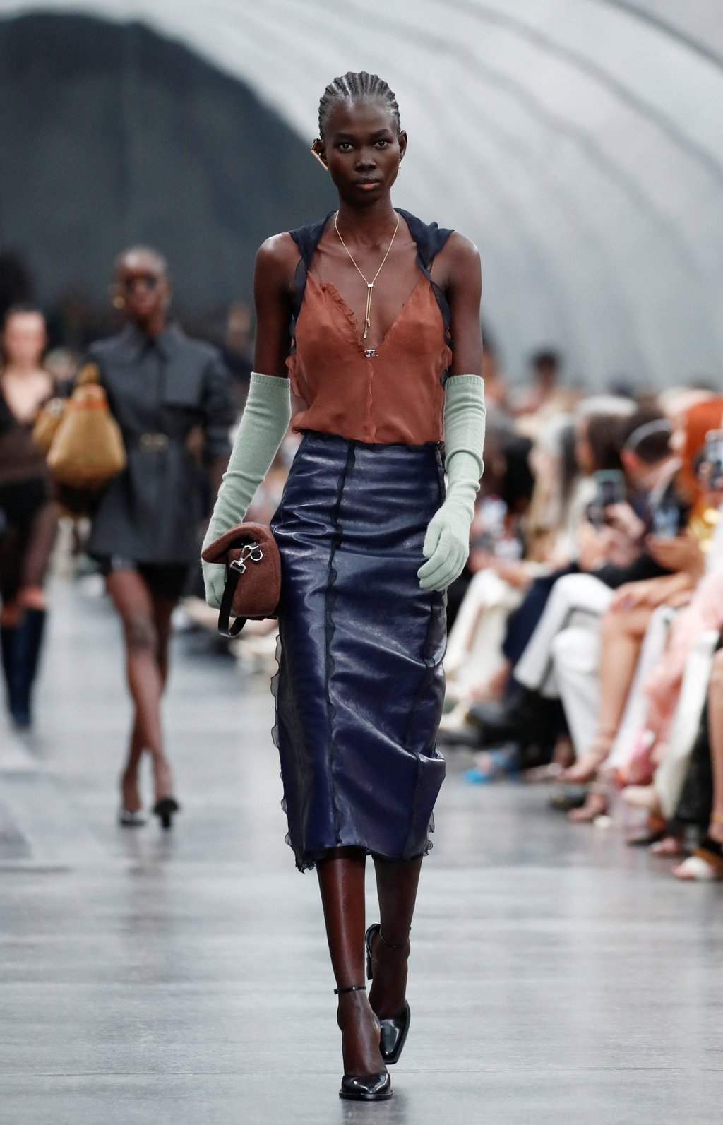 Milan Fashion Week 2022 How Fendi put a fresh spin on classic looks including collections by Karl Lagerfeld for its women s autumn winter 2022 23 show with Bella Hadid leading the pack