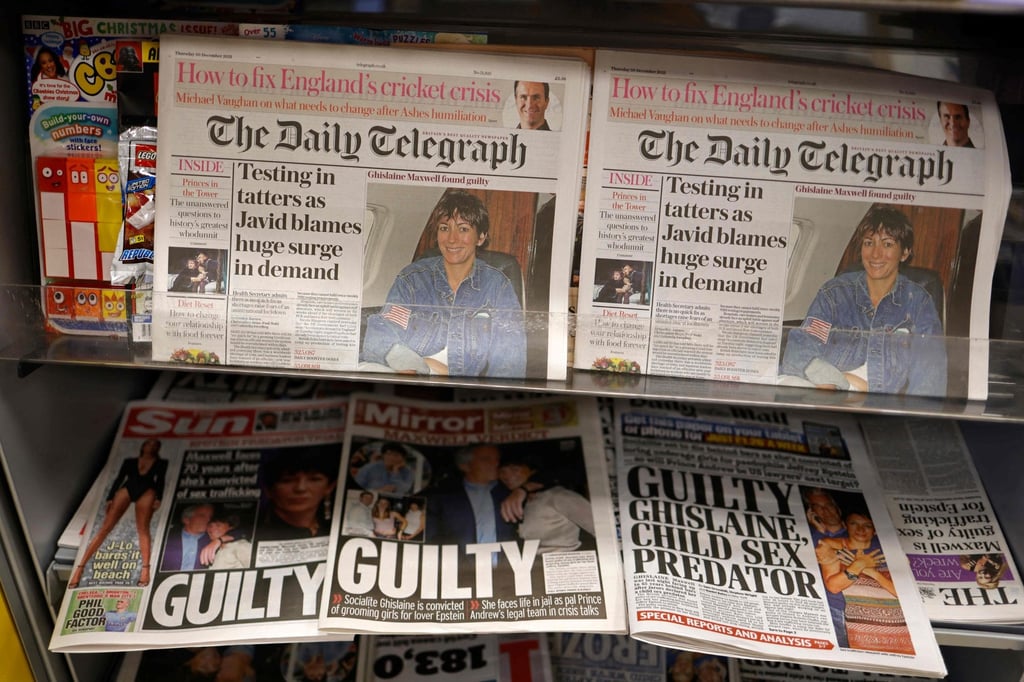 A selection of headlines from British newspapers is seen at a store in London on December 30, the morning after a jury in New York found Ghislaine Maxwell guilty of recruiting and grooming young girls to be sexually abused by the late American financier Jeffrey Epstein. Photo: AFP