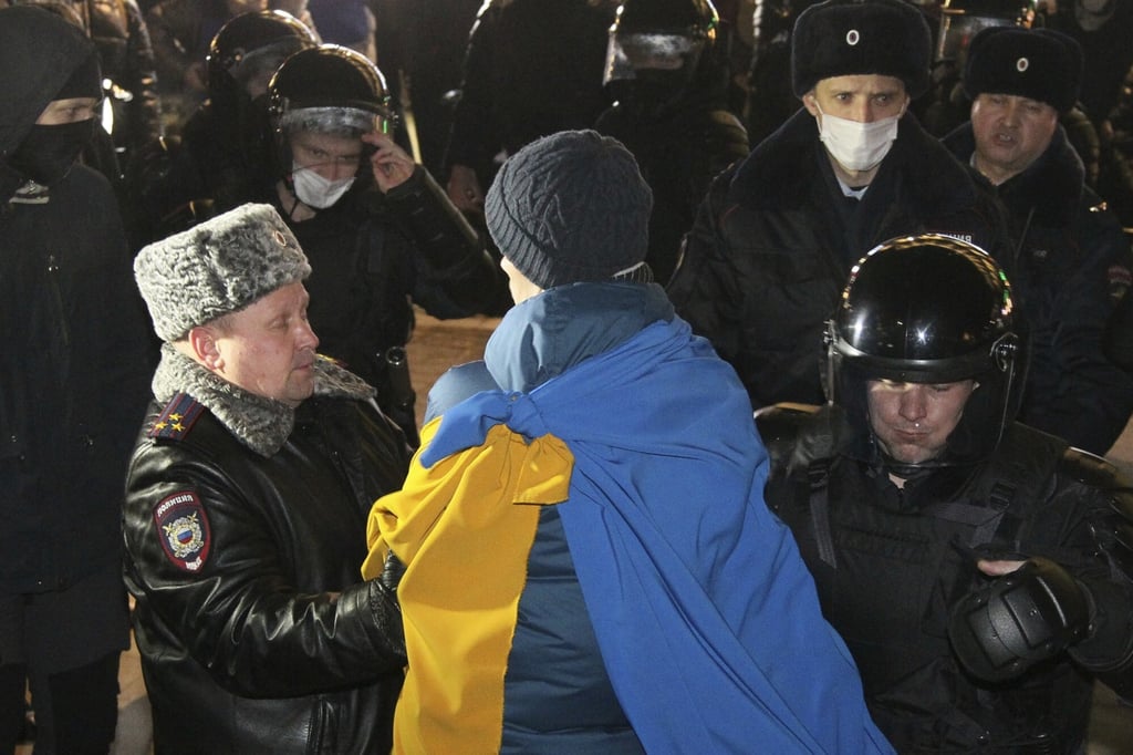 Police officers detain a protester in Nizhny Novgorod, Russia, on Thursday. Photo: AP