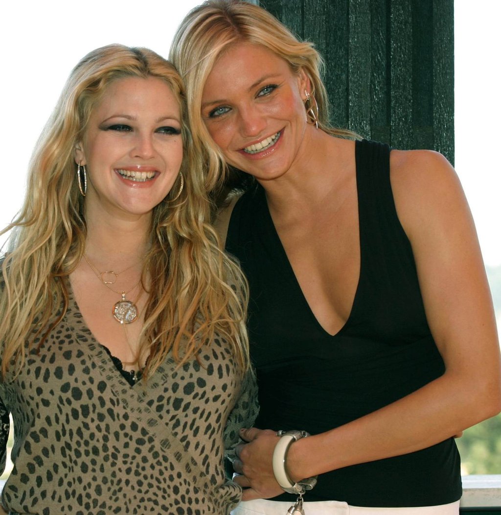 Cameron Diaz and Drew Barrymore, who starred together in the film Charlie’s Angels: Full Throttle, pose on the roof of a central Rome hotel, during a photo call in July 2003. Photo: AFP