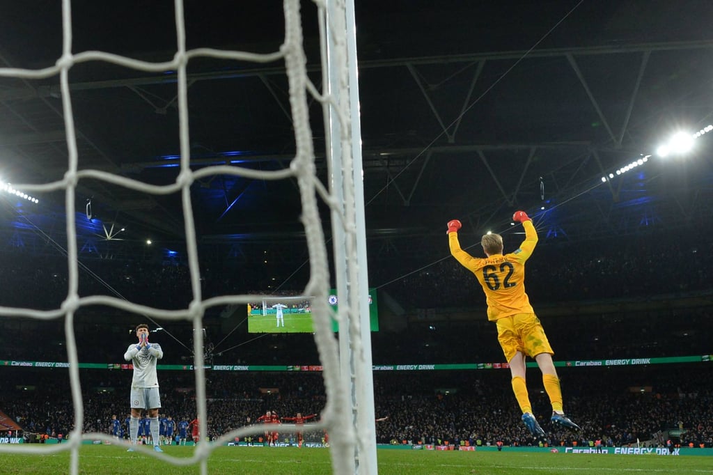 Liverpool goalkeeper Caoimhin Kelleher (right) celebrates after Chelsea goalkeeper Kepa Arrizabalaga misses his penalty. Photo: AFP Liverpool goalkeeper Caoimhin Kelleher (right) celebrates after Chelsea goalkeeper Kepa Arrizabalaga misses his penalty. Photo: AFP