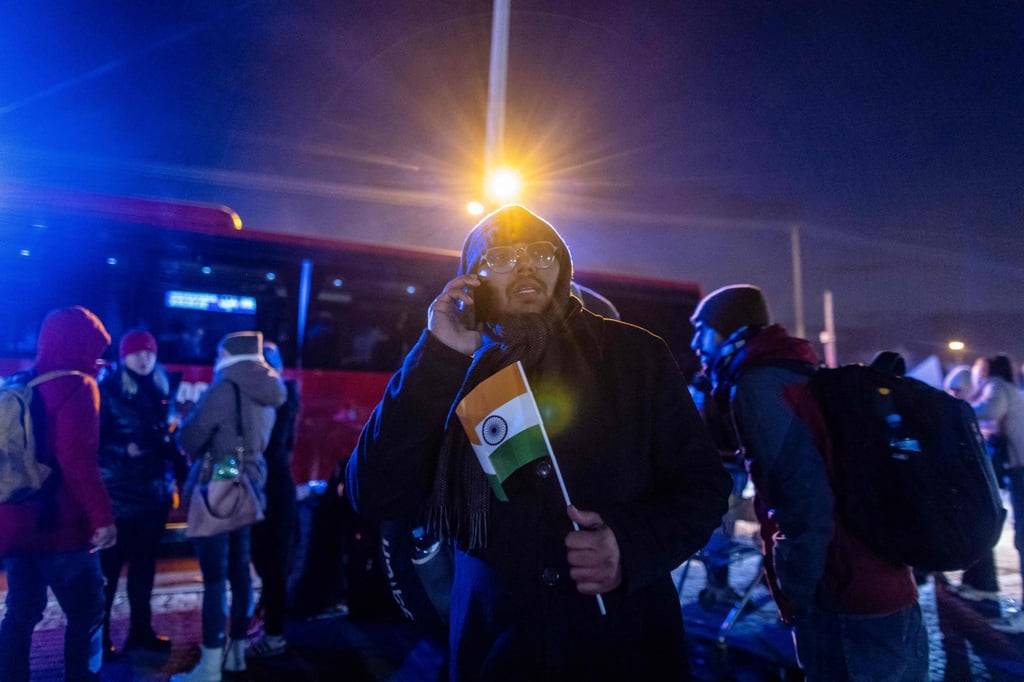 A man with an Indian flag arrives at the Medyka pedestrian border crossing, in Przemsyl, eastern Poland. Photo: AFP A man with an Indian flag arrives at the Medyka pedestrian border crossing, in Przemsyl, eastern Poland. Photo: AFP