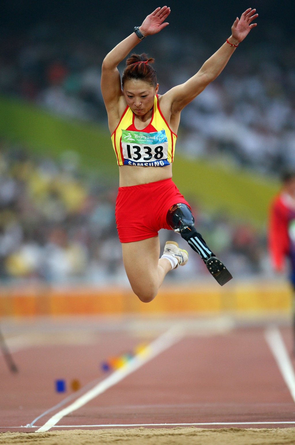 Zhang Haiyuan competes during the women’s long jump F42 final during the 2008 Paralympic Games in Beijing. Photo: Getty Images
