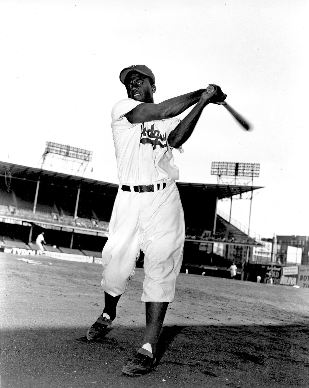 Jackie Robinson, infielder for the Brooklyn Dodgers, swings his bat in this action pose at Ebbett’s Field in Brooklyn, NY, on May 9, 1951. Photo: AP