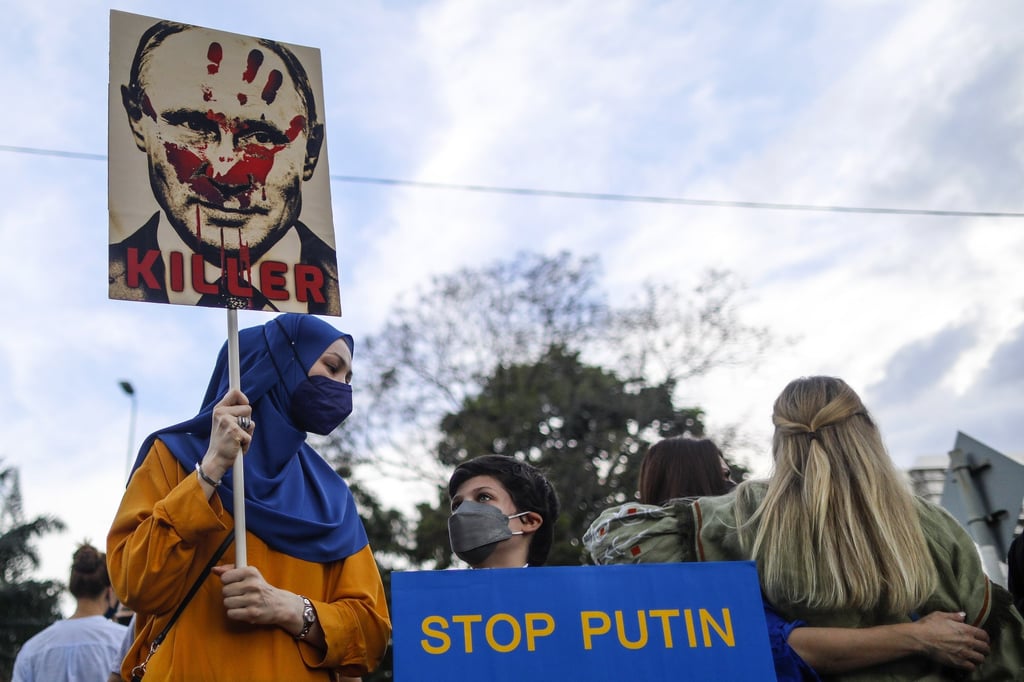 People gather for a protest over Russia’s invasion of Ukraine outside the Russian embassy in Kuala Lumpur. Photo: EPA-EFE