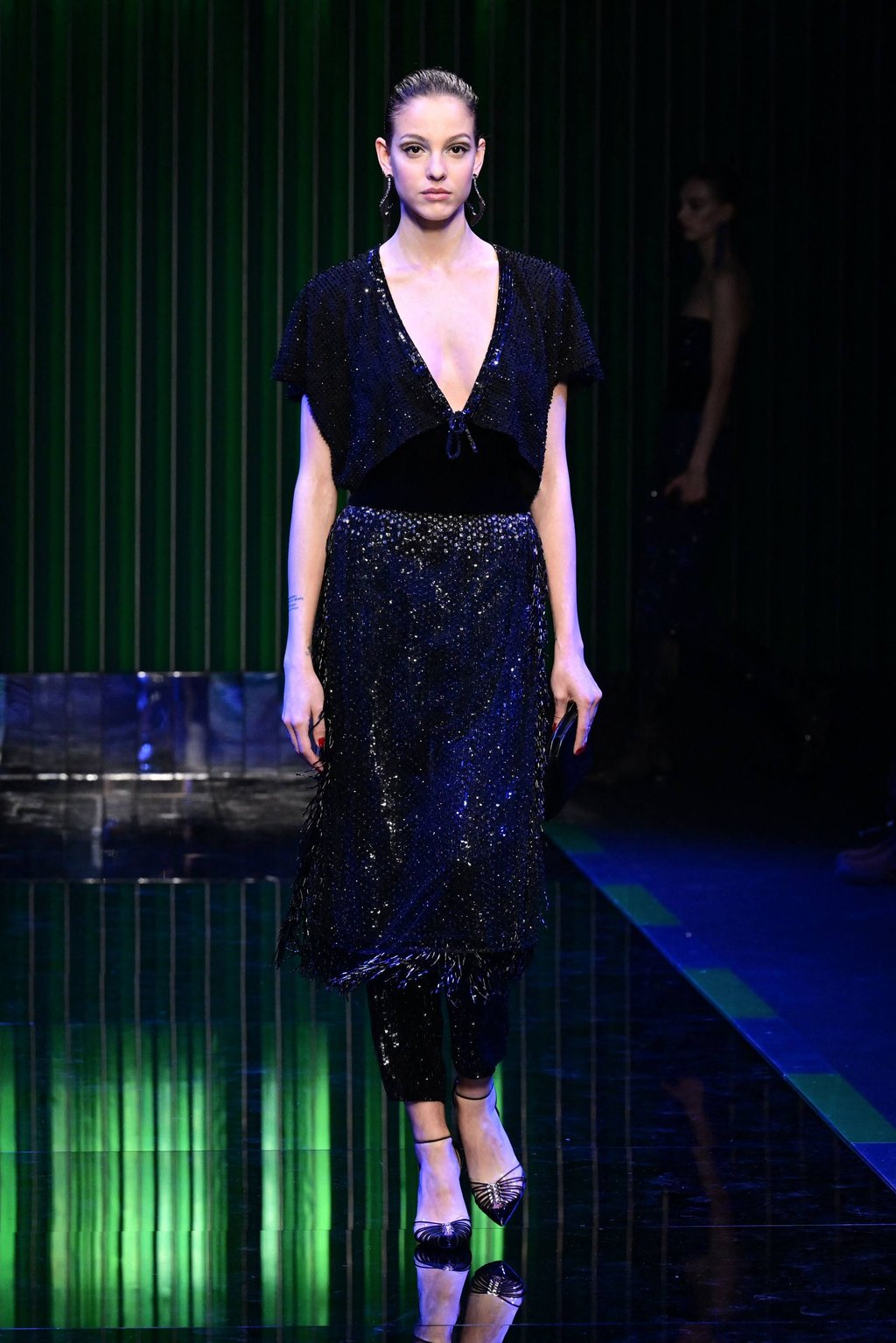 Sequins featured in several of Giorgio Armani’s designs. Photo: AFP Sequins featured in several of Giorgio Armani’s designs. Photo: AFP