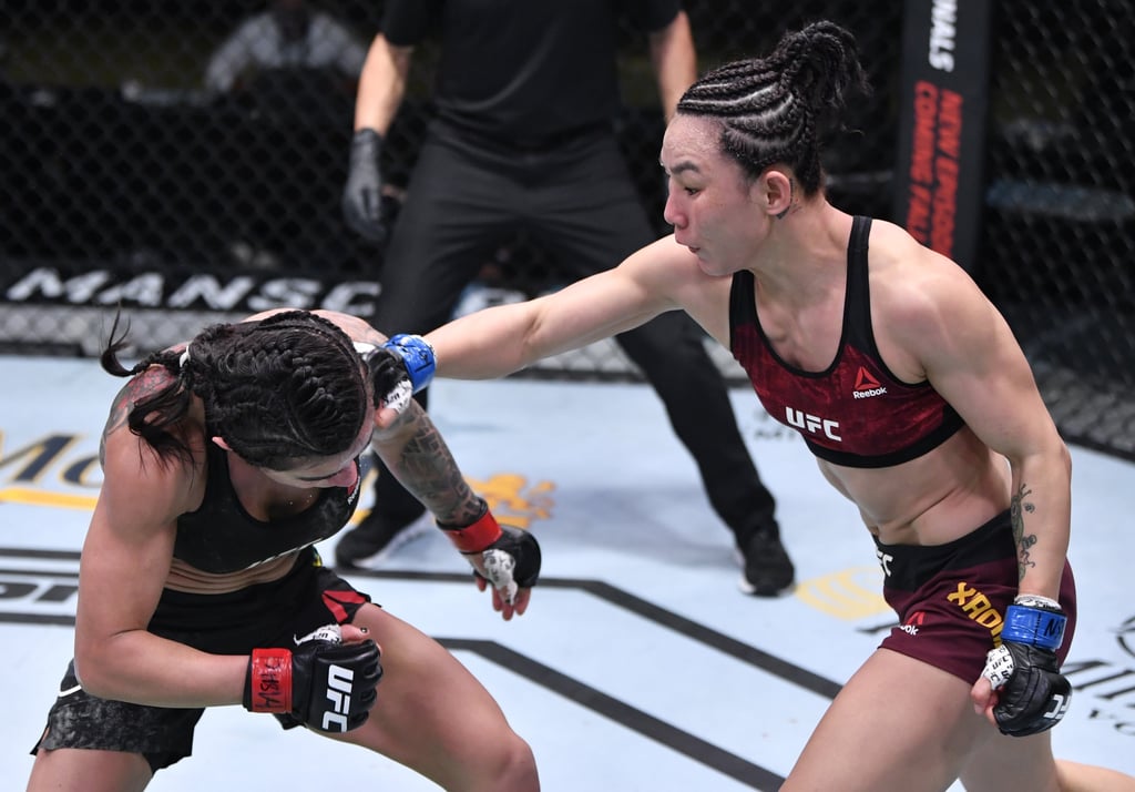 Yan Xiaonan punches Claudia Gadelha during their strawweight clash at UFC Fight Night in Las Vegas. Photo: Zuffa LLC