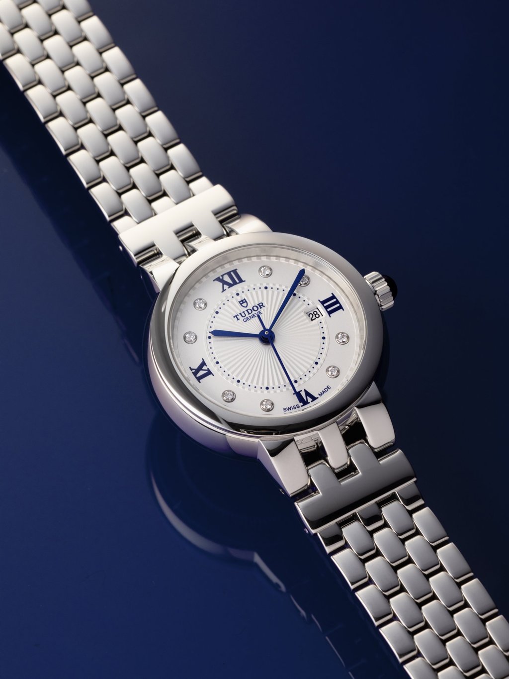 The Clair de Rose is available in three sizes, each with a choice of two styles of numeral: all in blue Roman characters, or with diamonds in place of eight of the numbers. Photo: Tudor