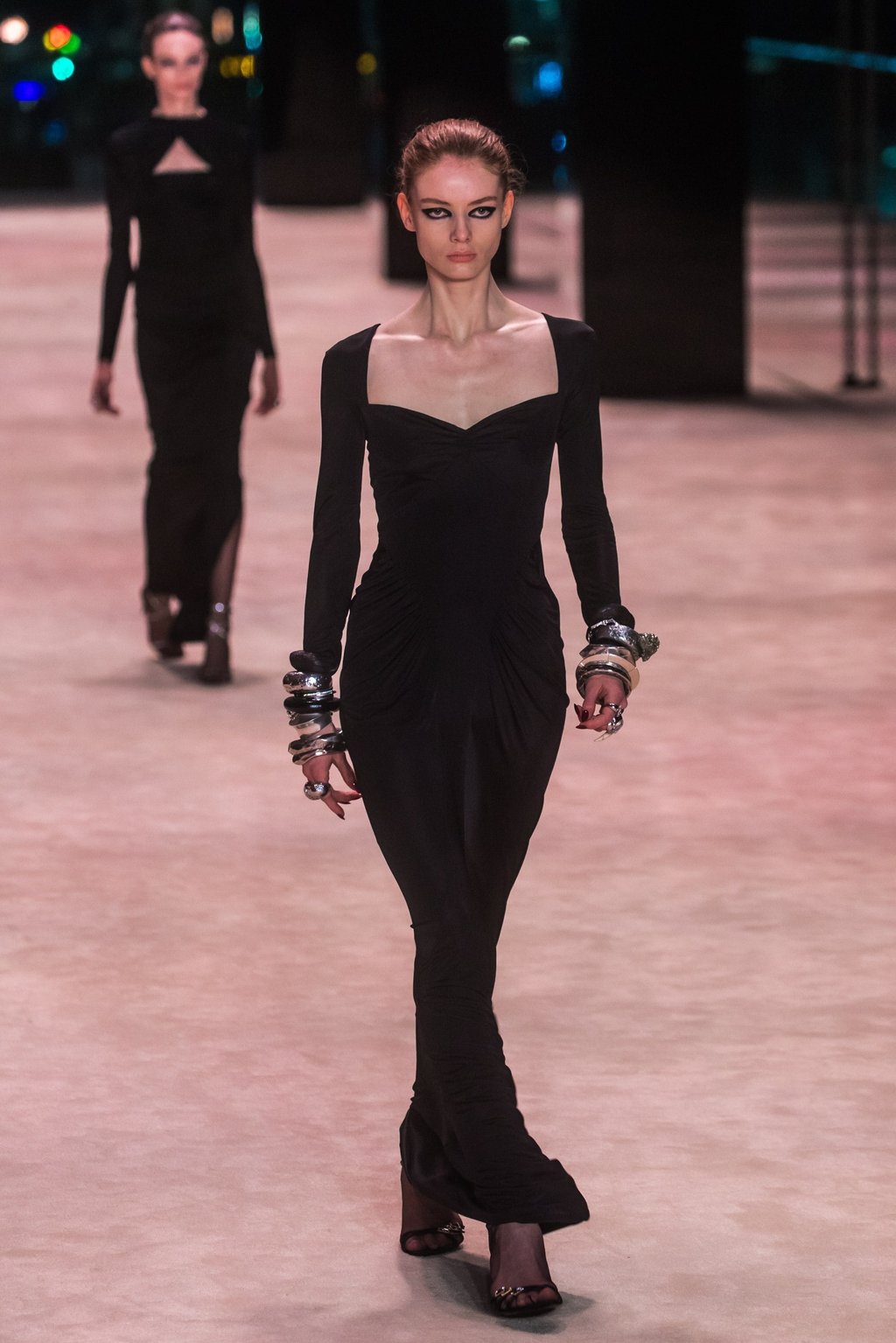 Sleek black dresses were a dominant theme of the autumn/winter 2022-23 Saint Laurent women’s collection on March 1, as part of Paris Fashion Week 2022. Photo: EPA-EFE Sleek black dresses were a dominant theme of the autumn/winter 2022-23 Saint Laurent women’s collection on March 1, as part of Paris Fashion Week 2022. Photo: EPA-EFE