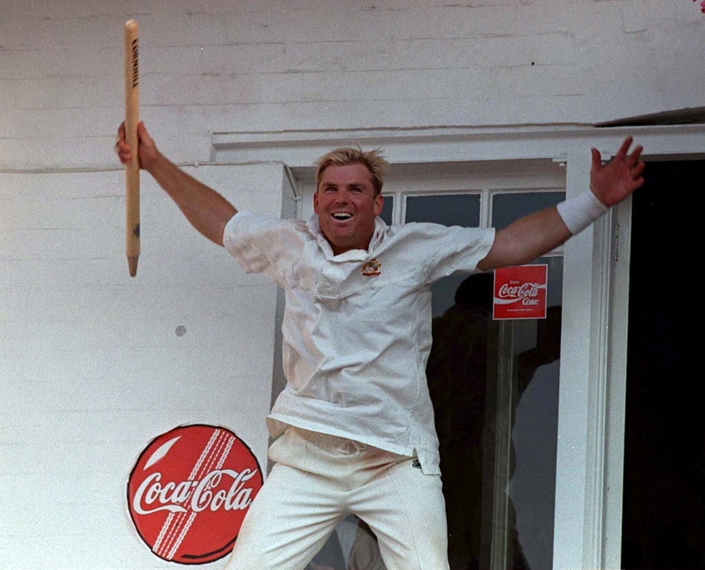 Shane Warne celebrates after Australia retain the Ashes in 1997. Photo: Action Images/File