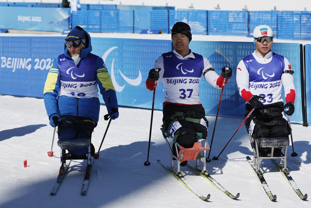 (From left) silver medallist Taras Rad of Ukraine, gold medallist Liu Zixu and bronze medallist Liu Mengtao of China after the Para biathlon men’s sprint sitting qualifier event at the Beijing Winter Paralympic Games at the National Biathlon Centre in Zhangjiakou. Photo: Reuters (From left) silver medallist Taras Rad of Ukraine, gold medallist Liu Zixu and bronze medallist Liu Mengtao of China after the Para biathlon men’s sprint sitting qualifier event at the Beijing Winter Paralympic Games at the National Biathlon Centre in Zhangjiakou. Photo: Reuters
