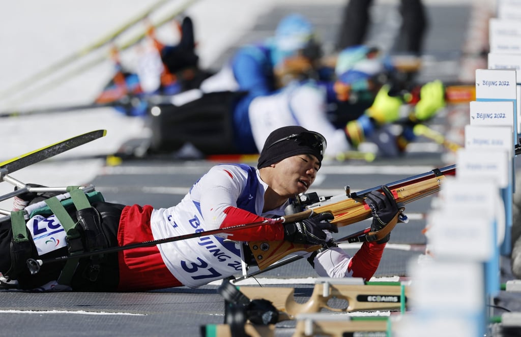 China’s gold medal winner Liu Zixu in the Para biathlon men’s sprint sitting qualifier event at the Beijing Winter Paralympic Games at the National Biathlon Centre in Zhangjiakou. Photo: Reuters China’s gold medal winner Liu Zixu in the Para biathlon men’s sprint sitting qualifier event at the Beijing Winter Paralympic Games at the National Biathlon Centre in Zhangjiakou. Photo: Reuters