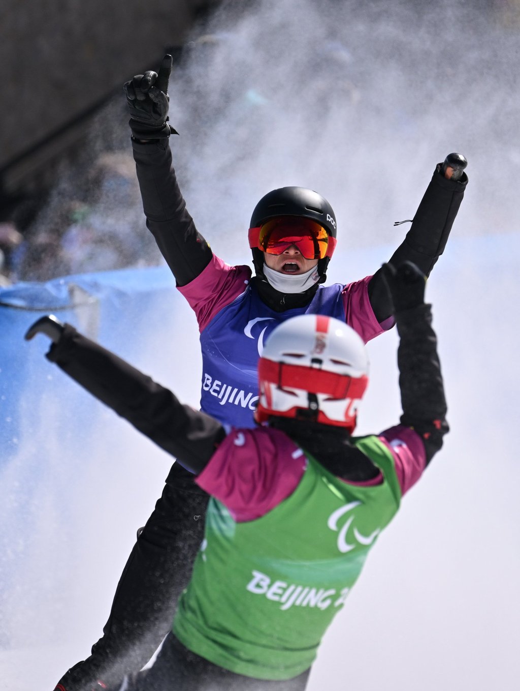 Ji Lijia, of China, celebrates after winning the Para snowboard men’s cross gold. Photo: Xinhua
