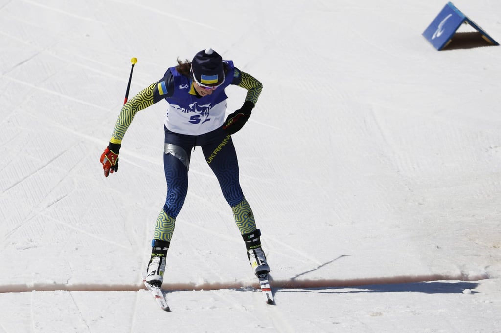 Iryna Bui of Ukraine crosses the line to win gold in women’s middle distance standing. Photo: Reuters Iryna Bui of Ukraine crosses the line to win gold in women’s middle distance standing. Photo: Reuters