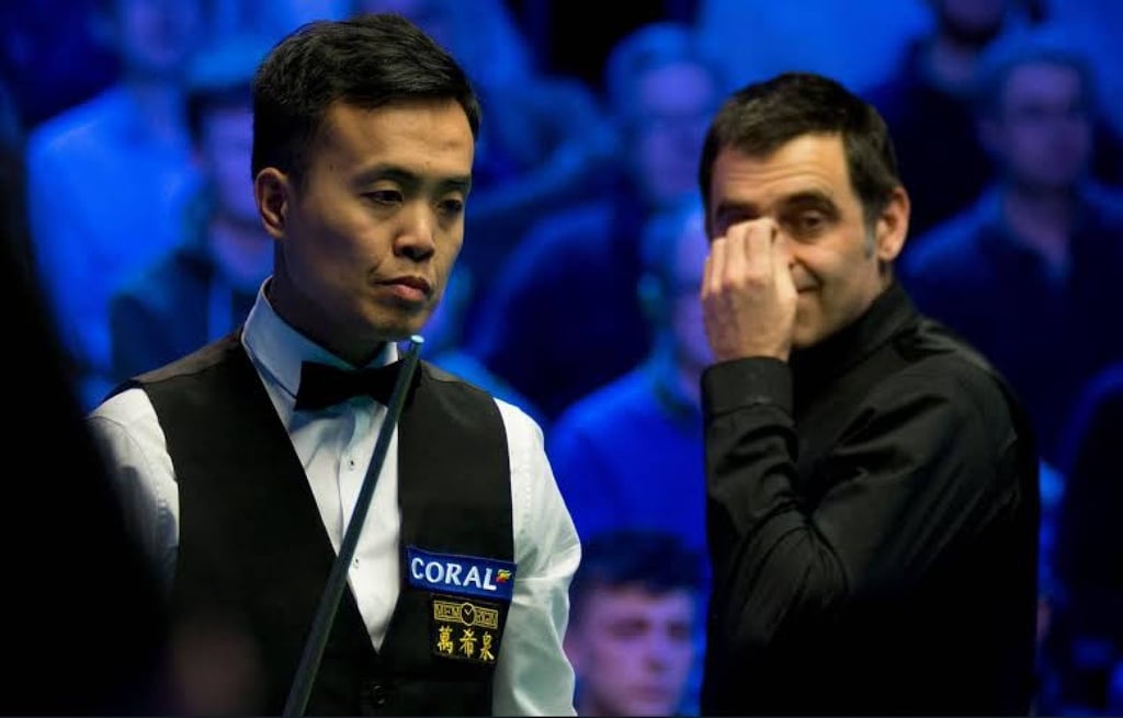 Marco Fu takes on Ronnie O’Sullivan at the Coral World Grand Prix in Cheltenham. Photo: Handout Marco Fu takes on Ronnie O’Sullivan at the Coral World Grand Prix in Cheltenham. Photo: Handout