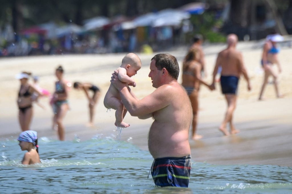 Russian tourists at a beach resort in Phuket, Thailand, in 2020. Asian destinations can expect a big drop in arrivals from Russia amid the economic sanctions imposed for its invasion of Ukraine, a Booking.com executive say. Photo: AFP