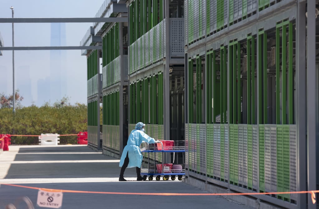 Health workers work in Penny’s Bay on Lantau Island. Photo: Sam Tsang