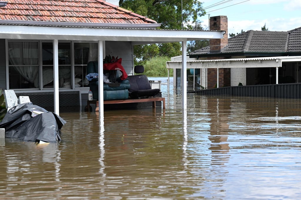 Houses inundated with floodwaters along the overflowing Hawkesbury River in the Windsor suburb of Sydney on Wednesday. Photo: AFP Houses inundated with floodwaters along the overflowing Hawkesbury River in the Windsor suburb of Sydney on Wednesday. Photo: AFP