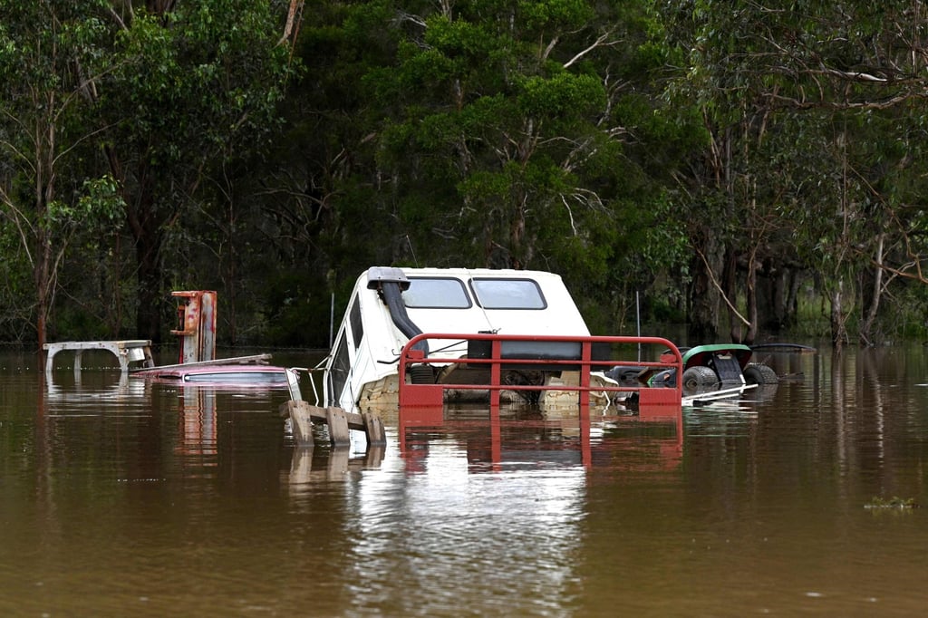 Vehicles in floodwaters near Sydney on Wednesday. Photo: AFP Vehicles in floodwaters near Sydney on Wednesday. Photo: AFP