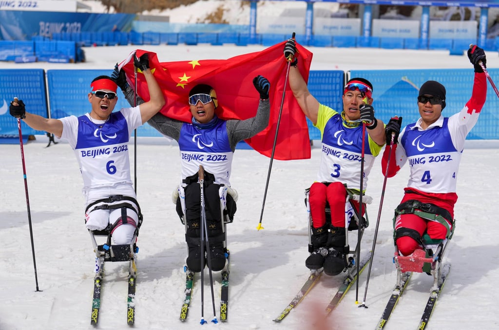 (From left) China’s Wang Tao, Zheng Peng, Mao Zhongwu and Liu Zixu after the men’s cross-country skiing sprint sitting final event at the Zhangjiakou National Biathlon Centre, during the Beijing Winter Paralympic Games. Photo: Xinhua (From left) China’s Wang Tao, Zheng Peng, Mao Zhongwu and Liu Zixu after the men’s cross-country skiing sprint sitting final event at the Zhangjiakou National Biathlon Centre, during the Beijing Winter Paralympic Games. Photo: Xinhua
