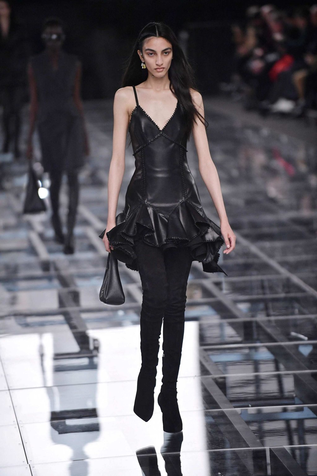 A model dons all black, a popular colour choice at the Givenchy autumn/winter 2022-2023 collection fashion show during the Paris Womenswear Fashion Week, in Nanterre, on the outskirts of Paris, on March 6. Photo: AFP