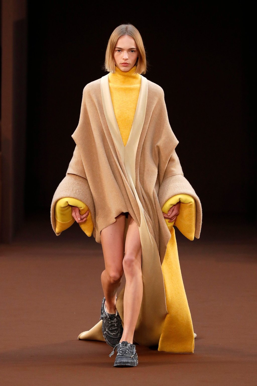 A model steps out in a fun interpretation of a classic poncho, a creation in Loewe’s autumn/winter 2022 ready-to-wear collection during Paris Fashion Week in Paris, France, on March 4. Photo: Xinhua