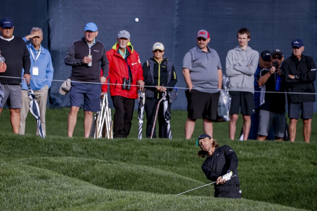 Tommy Fleetwood chips on the ninth hole during the first round of The Players Championship. Photo: EPA-EFE