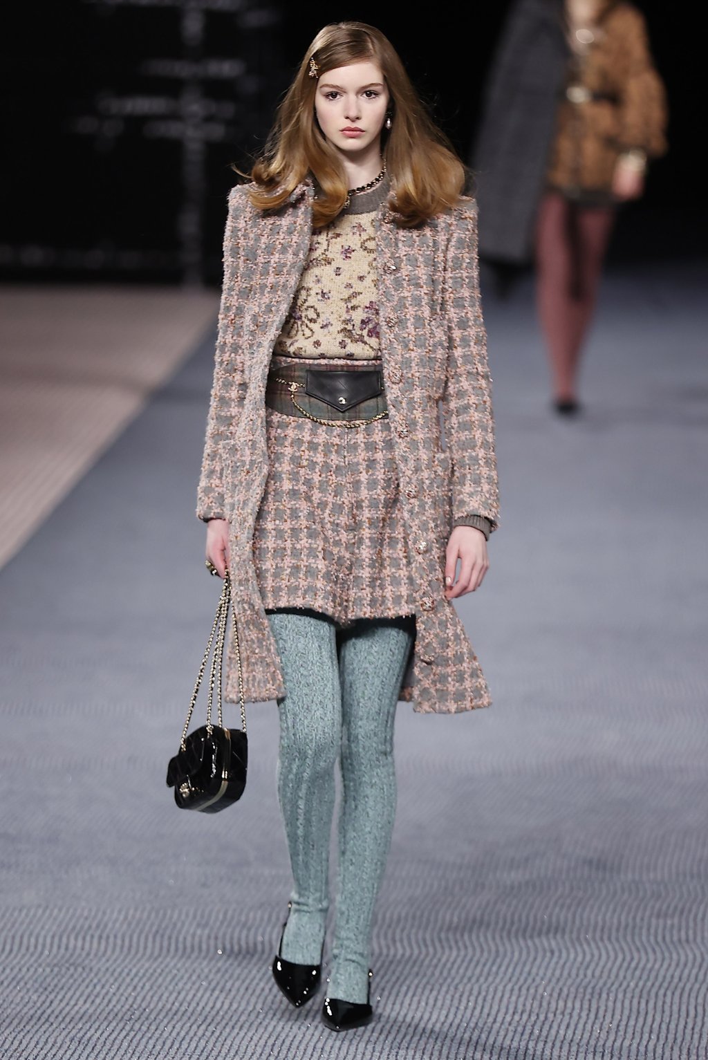 Tweed has become synonymous with Chanel, and it featured strongly in the brand’s autumn/winter 2022-23 women’s collection by French designer Virginie Viard during the Paris Fashion Week, in Paris, France, on March 8. Photo: EPA-EFE
