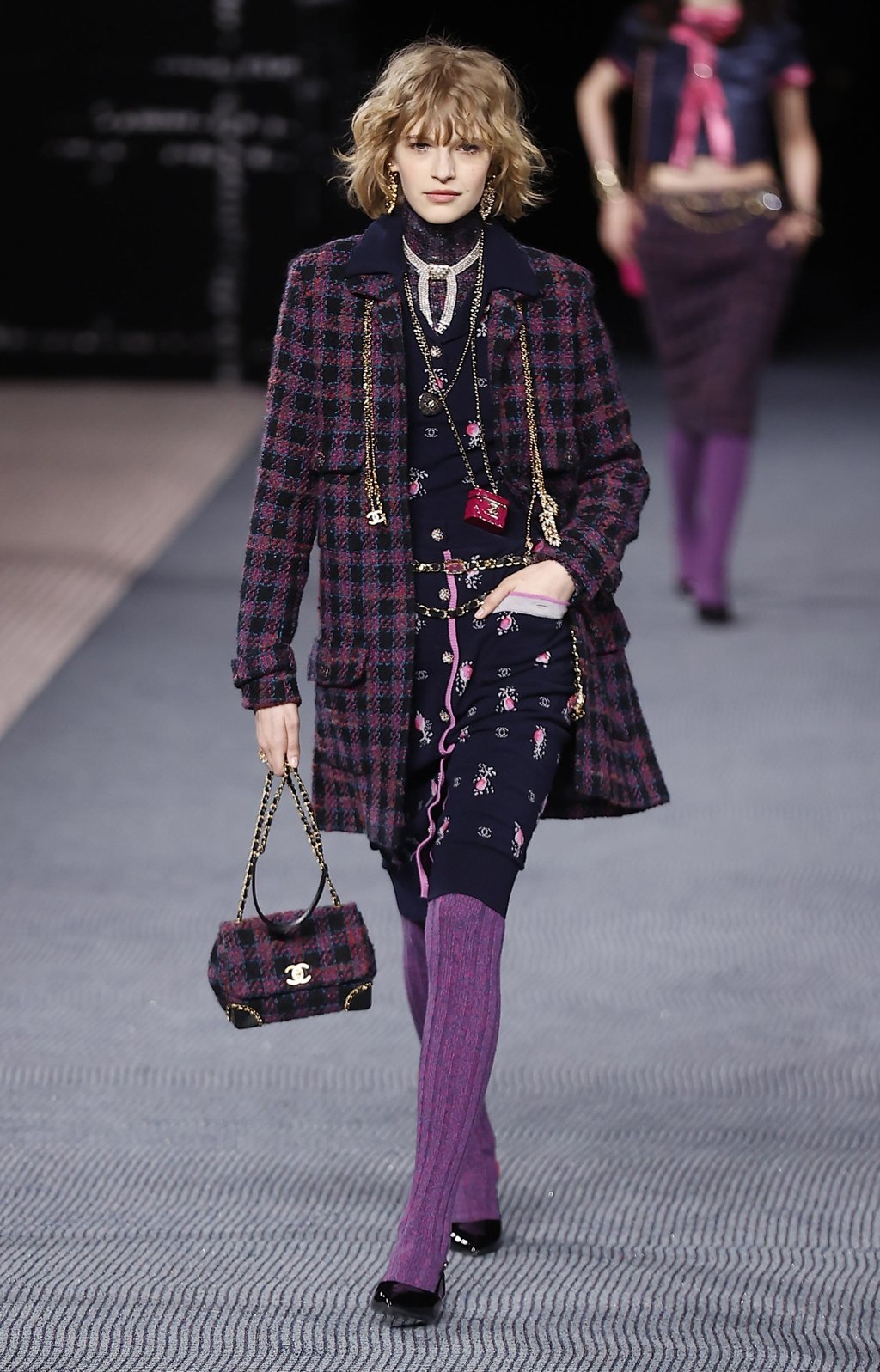 Chanel’s autumn/winter 2022-23 women’s collection drew on Gabrielle “Coco” Chanel’s time in Scotland, where she got inspiration from flowers. Photo: EPA-EFE