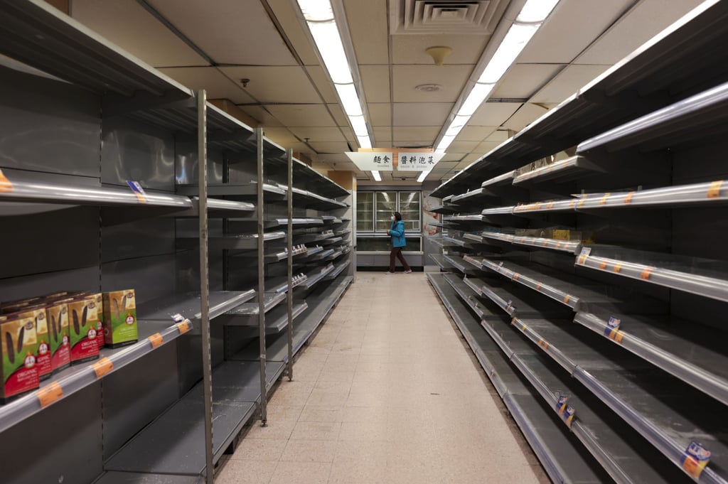 Empty shelves are seen in a supermarket at Sai Wan Ho under the rumour of the citywide lockdown to be imposed amid the fifth wave of coronavirus outbreak. Sam Tsang Empty shelves are seen in a supermarket at Sai Wan Ho under the rumour of the citywide lockdown to be imposed amid the fifth wave of coronavirus outbreak. Sam Tsang