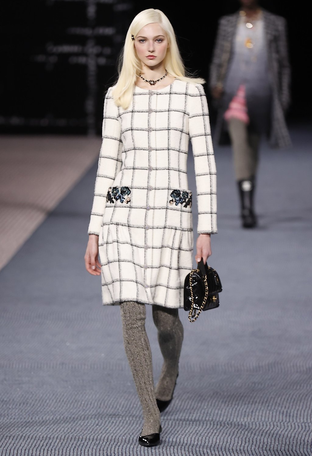 A refined monochrome look features in Chanel’s presentation during the Paris Fashion Week, in Paris, France, on March 8. Photo: EPA-EFE