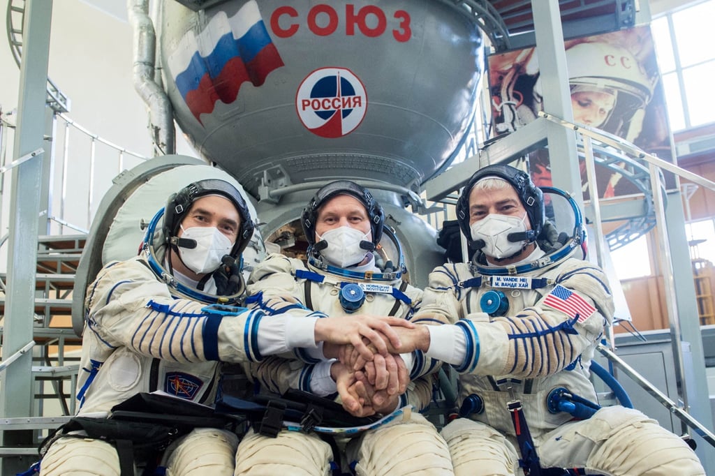 Russian cosmonauts Pyotr Dubrov, Oleg Novitskiy and Nasa astronaut Mark Vande Hei are due to return to Earth on March 30. Photo: Reuters Russian cosmonauts Pyotr Dubrov, Oleg Novitskiy and Nasa astronaut Mark Vande Hei are due to return to Earth on March 30. Photo: Reuters