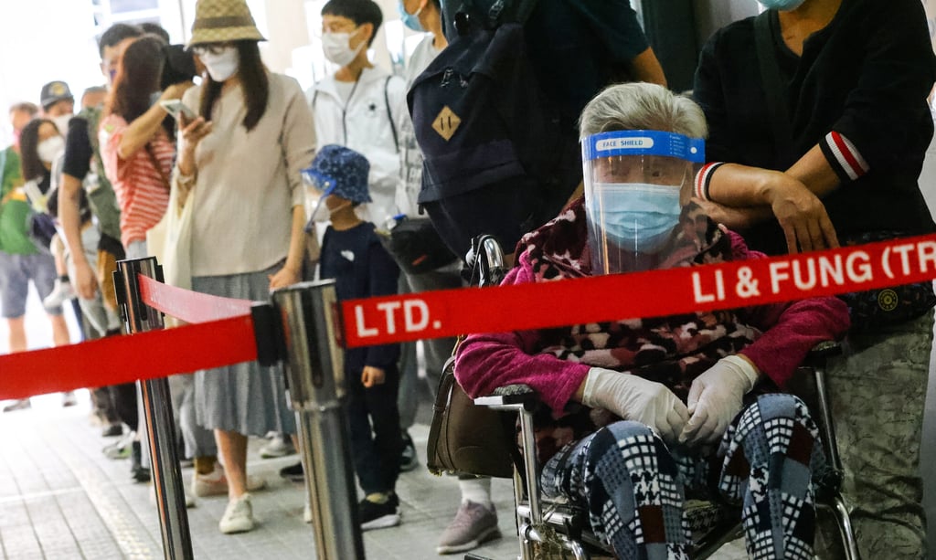 People line up for Sinovac shots at a community vaccination centre in Cheung Sha Wan. Photo: Dickson Lee