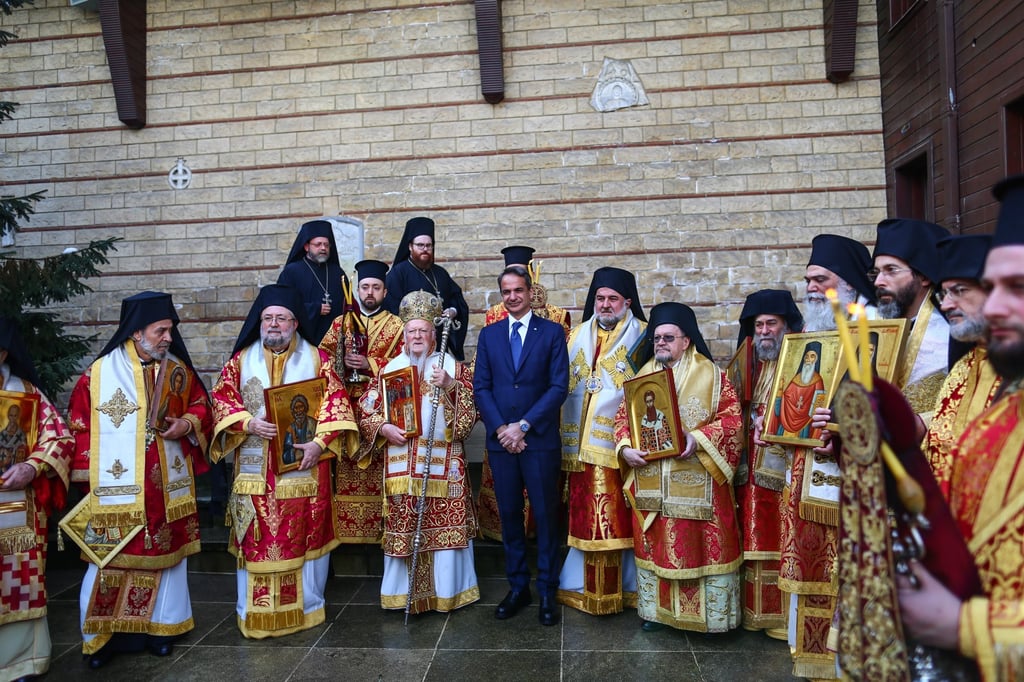 Greek Prime Minister Kyriakos Mitsotakis, centre, and Greek Orthodox Ecumenical Patriarch Bartholomew I, third from left, after a service at St George’s Church in Istanbul, Turkey on March 13. Photo: EPA-EFE Greek Prime Minister Kyriakos Mitsotakis, centre, and Greek Orthodox Ecumenical Patriarch Bartholomew I, third from left, after a service at St George’s Church in Istanbul, Turkey on March 13. Photo: EPA-EFE