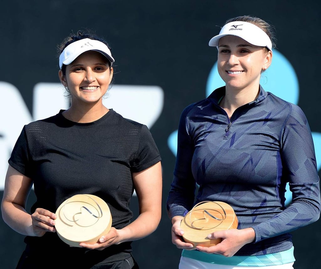 Sania Mirza (left) with her partner Nadiia Kichenok after winning the WTA Hobart International trophy in 2020. Photo: @mirzasaniar/Instagram