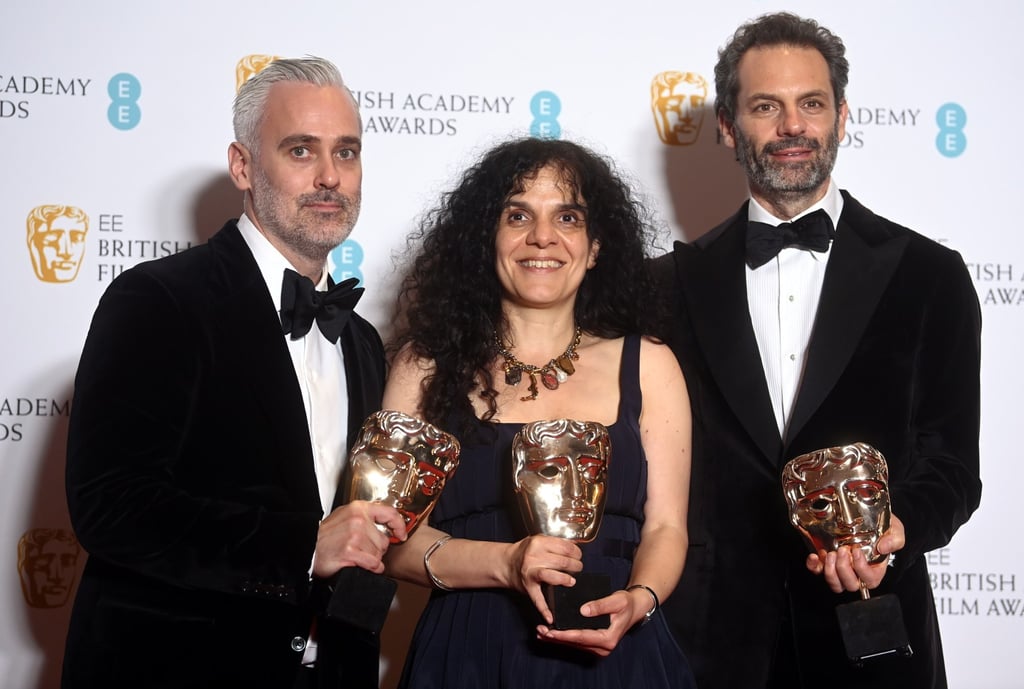 From left, Iain Canning, Tanya Seghatchian and Emile Sherman, winners of the Best Film award for The Power of the Dog, at the Royal Albert Hall in London on March 13. Photo: EPA-EFE