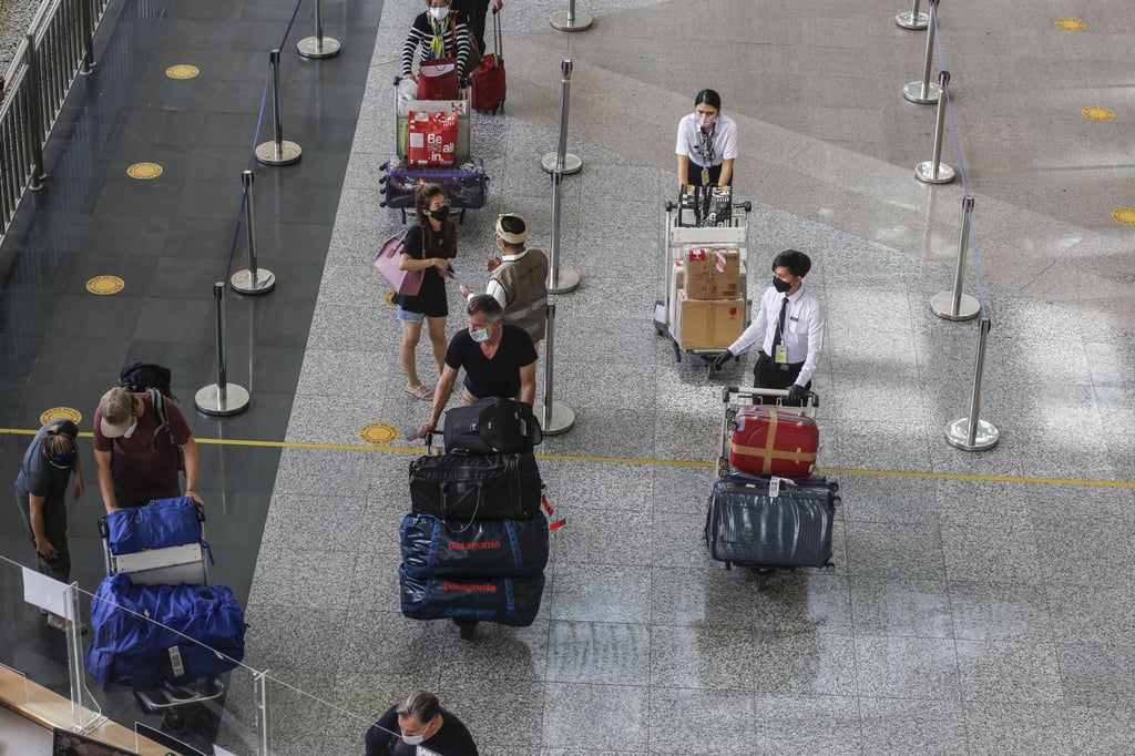 Foreign travellers arrive at I Gusti Ngurah Rai International Airport in Kuta, Bali, Indonesia on March 7, 2022. Photo: Getty Images Foreign travellers arrive at I Gusti Ngurah Rai International Airport in Kuta, Bali, Indonesia on March 7, 2022. Photo: Getty Images