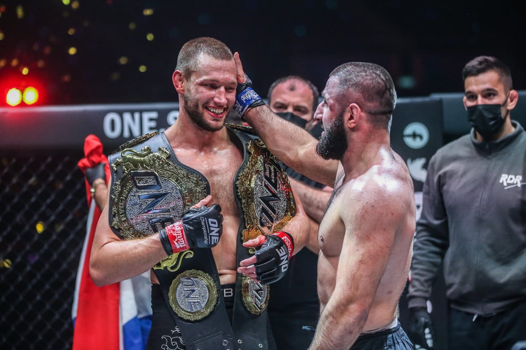 Kiamrian Abbasov congratulates two-division champion Reinier de Ridder (left) after their fight at ONE: Full Circle. Kiamrian Abbasov congratulates two-division champion Reinier de Ridder (left) after their fight at ONE: Full Circle.