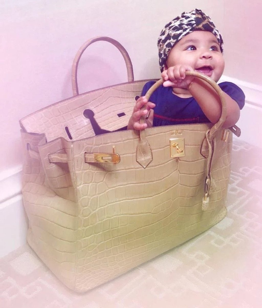 Baby True Thompson in an Hermès Birkin bag. Photo: @khloekardashian/Instagram