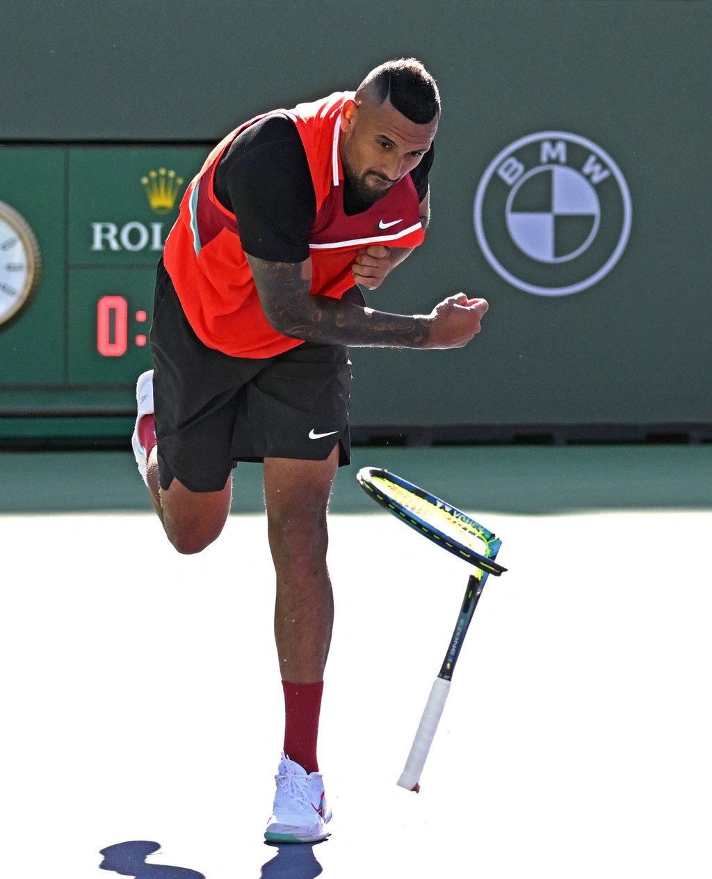 Nick Kyrgios smashes his racket on the court during his quarter final match against Rafael Nadal. Photo: USA TODAY Sports
