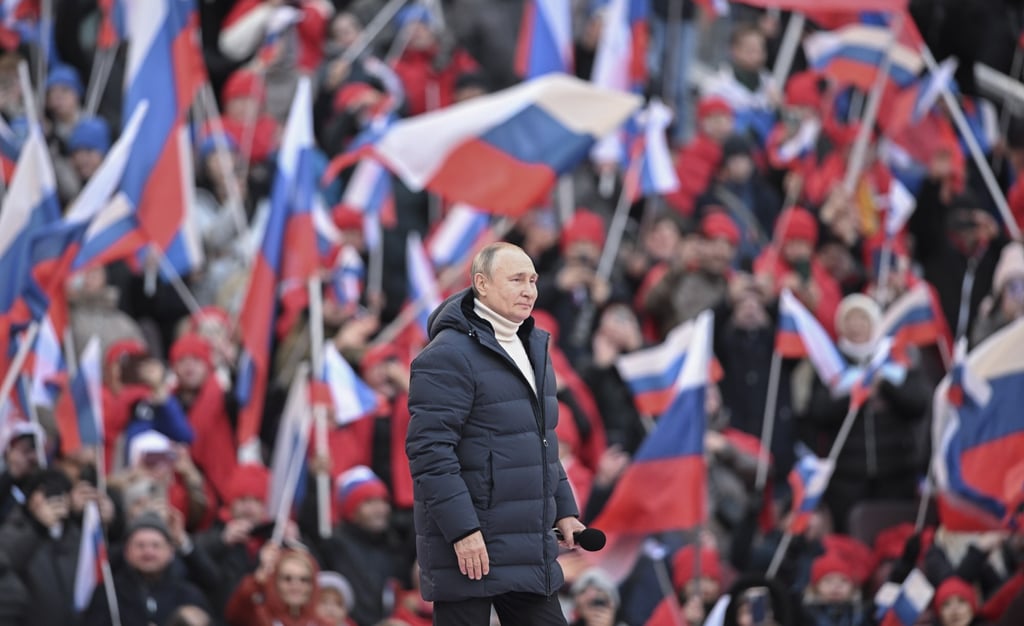 Vladimir Putin attends a concert marking the 8th anniversary of Crimea’s reunification with Russia at the Luzhniki stadium in Moscow, Russia, on March 18. Photo: EPA-EFE Vladimir Putin attends a concert marking the 8th anniversary of Crimea’s reunification with Russia at the Luzhniki stadium in Moscow, Russia, on March 18. Photo: EPA-EFE