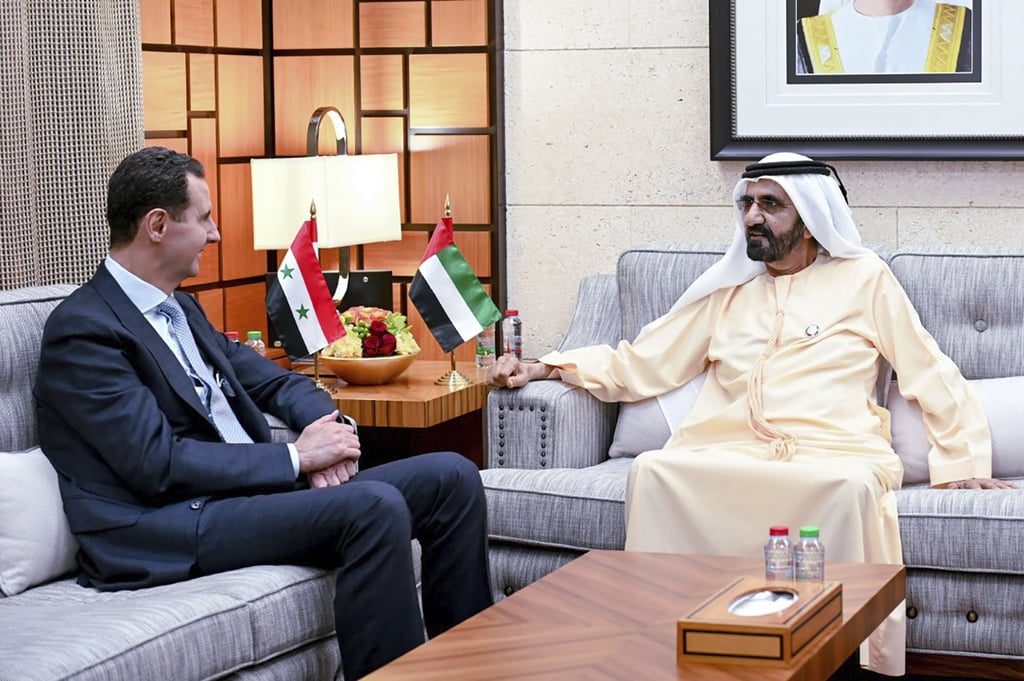 Sheikh Mohammed bin Rashid al-Maktoum, ruler of Dubai, right, talks to Syrian President Bashar al-Assad in Dubai, United Arab Emirates on March 18. Photo: Emirates News Agency via AP