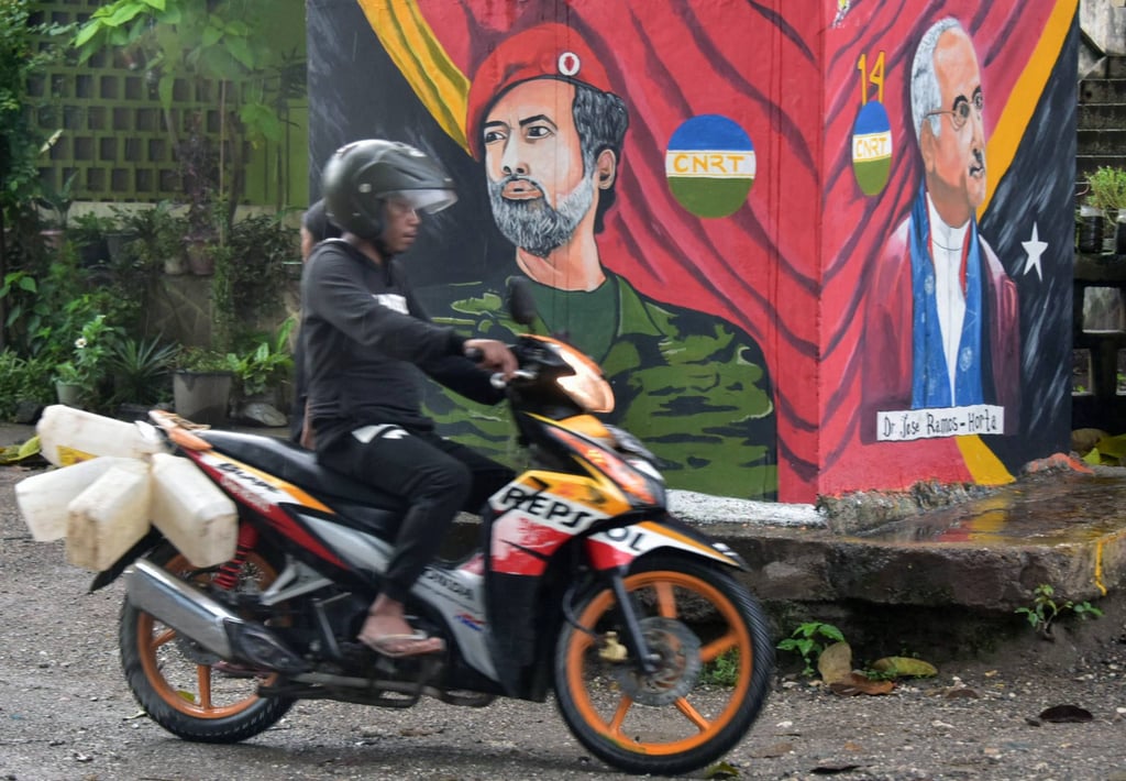 Murals depicting East Timor leaders Xanana Gusman, left, and Ramos Horta in Dili on the eve of the country’s presidential elections. Photo: AFP
