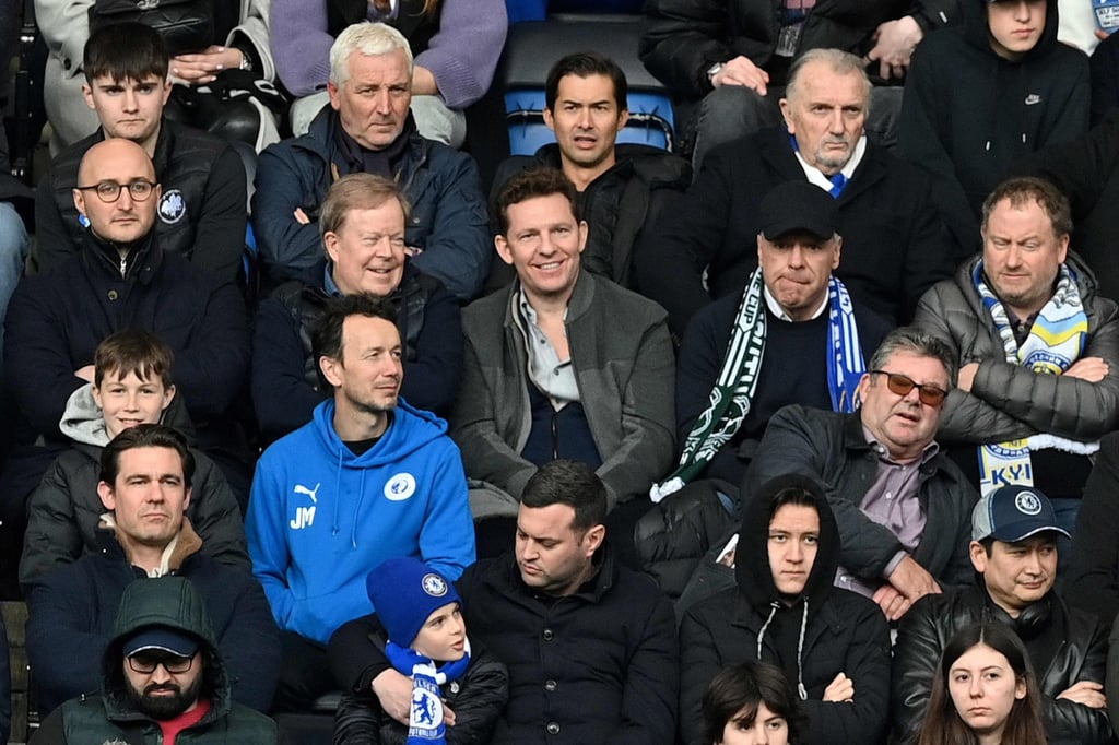 Property developer Nick Candy (centre) watches from the stands during the EPL match between Chelsea and Newcastle United at Stamford Bridge. Photo AFP